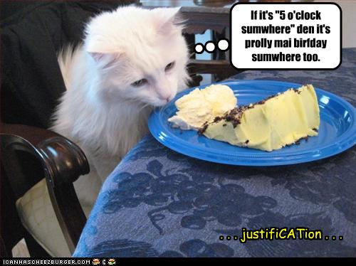 funny-pictures-cat-eats-birthday-cake.jpg
