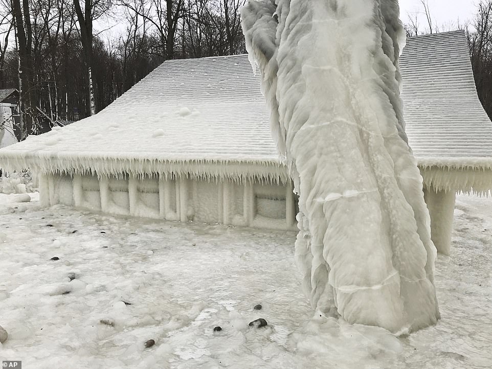 house covered by ice along lake ontario.jpg