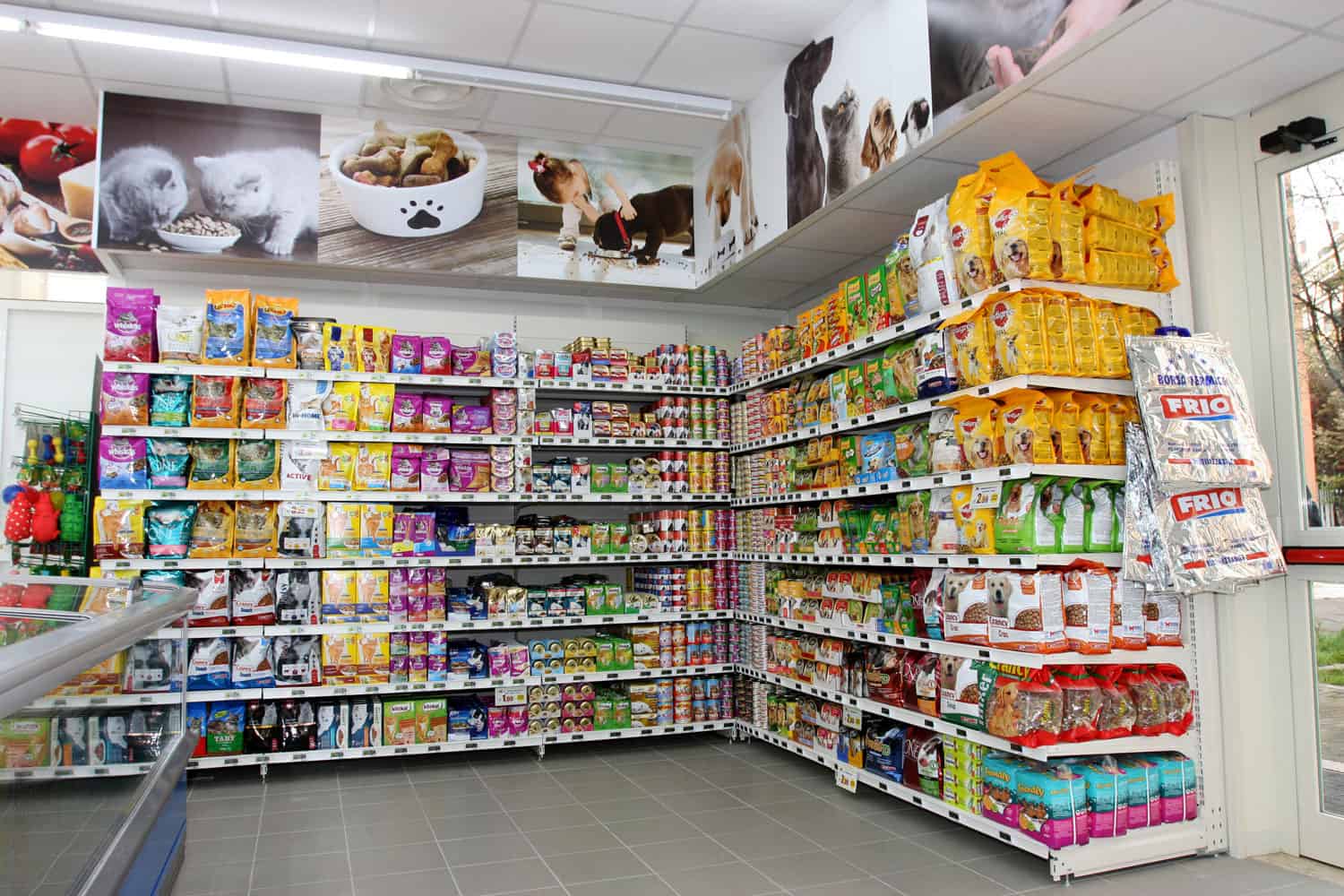 Pet food store shelves inside a new market (M.A. Supermarket) opening in Rome, Italy.
